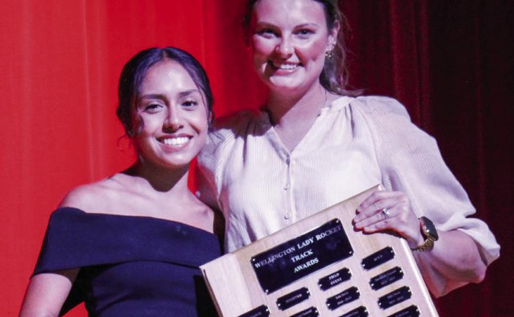 Wellington High School (WHS) junior Sabrina Segovia earns the Girls’ Track Distance Runner Award, presented by Coach Savannah Henderson, at WHS’s Academic and All-Sports Banquet at 5:30 p.m. Monday, May 12 in the WHS auditorium.