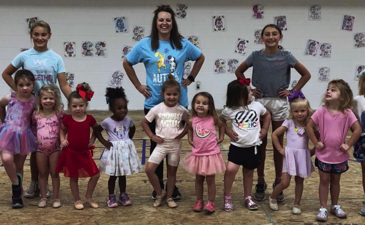 Kacy Cabbell’s Summer Dance Camp participants in the three- and four-year-old morning session pause between dances during the weeklong camp Thursday, June 8. Front row, from left: Baylee Rodriguez, Gentry Nevarez, Avery Bell, Kellyn Conner, Gia O’Rear, Emmi Conley, Whitley Souder, Zella McDaniel, Laura Lynn Hommel, Monroe Allred, Maddi Hightower, Emma Hightower, Evvy Kaas Kinney. Back row, from left: Ava Kate Inman, Kacy Cabbell, Claire Kane. Not pictured: Blake Lemons. The Red River Sun/Bev Odom