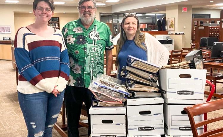 Clarendon College History Instructor Dr. Ken McIntosh, center, donates historic documents of W.E. Dode McIntosh, the Principal Chief of the Creek Nation, 1961-1972, to the Oklahoma Historical Society. From left: Clarendon College student Kayla Miller, K. McIntosh, Oklahoma Historical Society Registrar Veronica Redding. Contributors not pictured are Waldo McIntosh, Randy McIntosh and Gary Holloway. Randy McIntosh