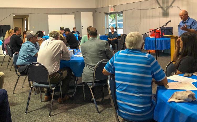 Tri-County Co-Op Manager Jeff Camp addresses the stockholders, special guests and visitors at the Annual Meeting on Thursday, Aug. 24 at the Dodson Family Life Center. By Bev Odom The Red River Sun/Bev Odom