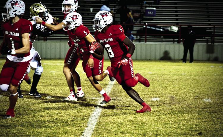 Wellington’s Kamron Brooks runs the ball against Memphis Friday, Nov. 7 at Powell Field in Wellington, where the Skyrockets shut out the Cyclones in a 57-0 final for the No. 2 seed in the district. Wellington High School Yearbook