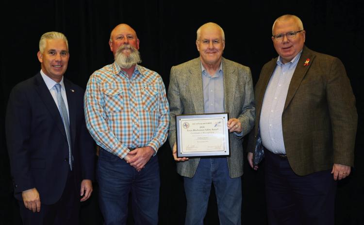 The Childress District of the Texas Department of Transportation (TxDOT) accepts the Texas Bluebonnet Safety Award, recognizing zero incidents in 2024. From left: The Associated General Contractors of Texas President Jeff Gibson, Childress District Safety Officer Jeremy Beck, Childress District Engineer Darwin Lankford, TxDOT Deputy Executive Director for Program Delivery Brian Barth. Texas Department of Transportaition
