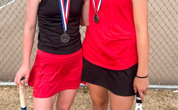 Tatum Martin, left, and Quinn Roberson, second-place girls’ doubles.