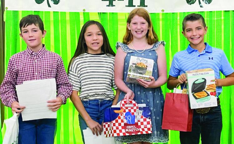 From left: Saylor Wyatt; Addison Solis; Liesel Schaefer, first place; Quay Bruce, second place.