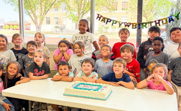 Overlooking the Collingsworth County Courthouse Square, the Wellington Opportunity Center students mark the last day of the Spring Session with a birthday party celebration. Angel’s Subs &amp; Sweets graciously donated the cake. The six-week summer session begins Monday, June 8. BEV ODOM/THE GREENBELT INTREPID