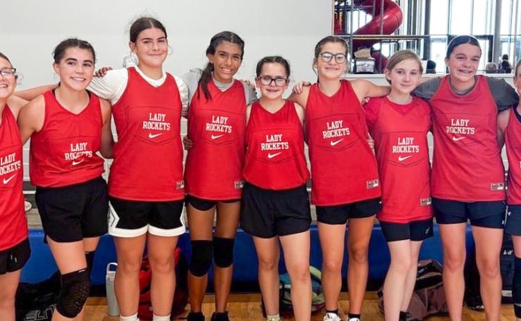 The eighth-grade Wellington Lady Firecrackers compete in a recent basketball camp in Elk City, Okla., developing basketball skills and learning new drills. From left: Abbygale Torrez, Quinn Roberson, Rachel Strickland, Seveyah Pena, Natalia Duran, Evelyn Henard, Veva Finnegan, Kenzlea Taylor, Tatum Martin. COURTESY PHOTO