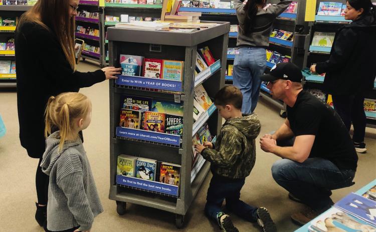 Hartman family visits Collingsworth Public Library’s book fair