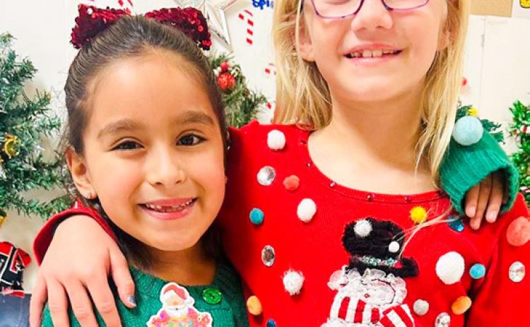 Wellington Elementary Sparklers sport ugly Christmas sweaters