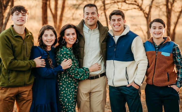 The Cantu family, including Jax, Callahan, Ashly, Jermaine, Noah and Collier, prepare to make their move to Hansford County, where Jermaine will serve as the superintendent of Gruver Independent School District. COURTESY PHOTO