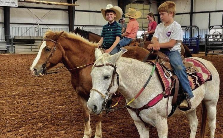 Childress 4-H Horse Club practices barrels,poles