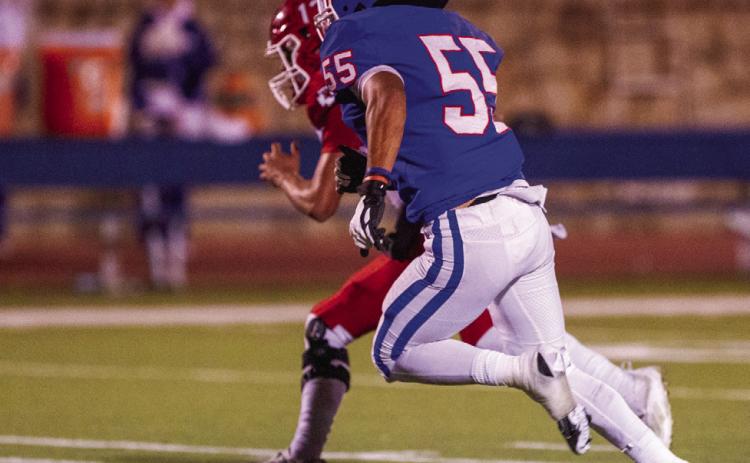 Childress’ Isaac Salinas (55) runs down Friona ballcarrier Jose Saucedo (13) during the Bobcats’ 45-7 sweep over the Chieftains last Friday, Nov. 4 at Fair Park Stadium. The Red River Sun/Nicole Dill