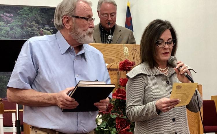 Vocalist and author Leah Fort, with her musician husband, Mike Fort, of Amarillo, accepts the pastorship of Wellington First Nazarene Church during a special service Sunday, Feb. 26, 2023. West Texas District Superintendent Dr. David Downs, of Fort Worth, presided over the conferment. Courtesy Photo