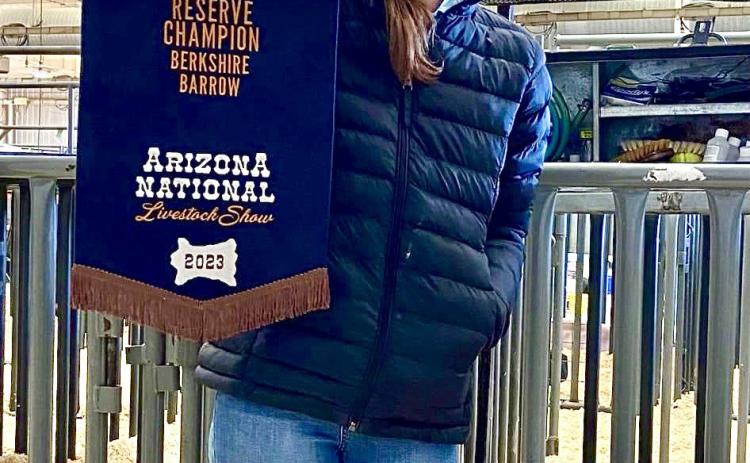 Memphis High School senior Emma Talley recently competed at the Arizona National Livestock Show, held Thursday, Dec. 28-Sunday, Dec. 31 at the Arizona State Fairgrounds, earning Reserve Champion Berkshire Barrow. Courtesy Photo