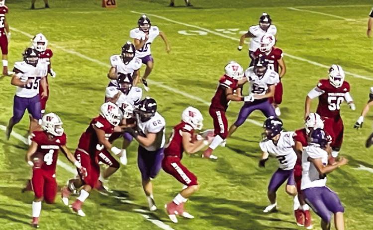 Skyrocket Gumaro Rincon (4) runs the ball behind the Rocket offensive line in a game against the undefeated Panhandle Panthers, where Wellington won 26-13 on Powell Field last Friday night, Sept. 23. The Red River Sun/Shauna Salinas