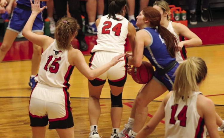 Childress’ Chloe Teichelman attempts to go up for a score during the Lady Cats’ 45-34 loss to Shallowater Friday, Feb. 3. Photo by Elizabeth Oronia
