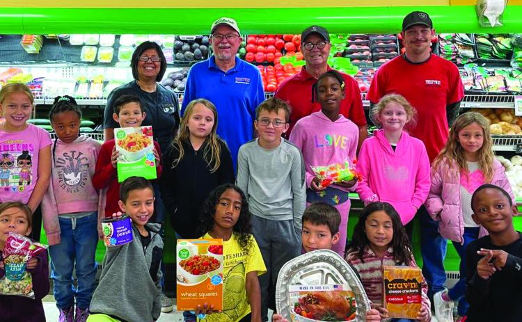 Austin Elementary School third-grade students take a fieldtrip to Thriftway, where they studied mixtures, including how easily mixtures, such as salads and mixed nuts, can be separated back into singular, individual items. Photos Courtesy of Memphis ISD