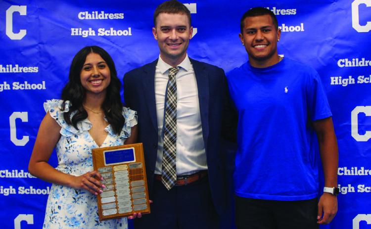 Head golf coach Wayne Parker, center, awards Lady Cat Golf Most Valuable Player (MVP) Isabella Jurado, left, and Bobcat Golf MVP Isaiah Jalomo, right.