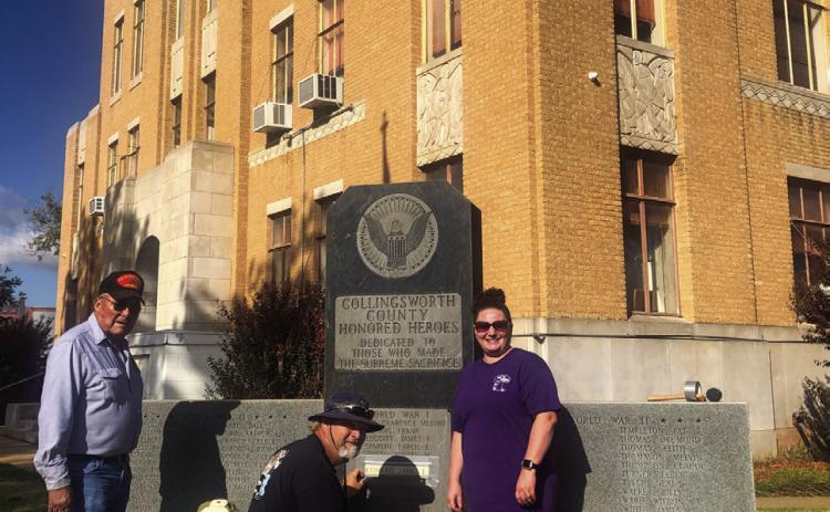 Dedicated to Collingsworth County veterans who made the supreme sacrifice, Kut In Stone owner Chad Ham, assisted by his wife, Heather Ham, of Vernon, etches omitted names of those killed in action on the Collingsworth County War Memorial on the grounds of the Collingsworth County Courthouse Thursday, Nov. 10. Glynn Moore Veterans of Foreign Wars Post 6439 Quartermaster Jr. Castillo, left, arranged for the names to be added.