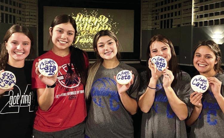 The junior varsity and varsity Childress Lady Cat volleyball teams celebrate teammate Journey Prince’s birthday Monday, Sept. 19 at The Palace Theater. From left, Chloe Churchill, Prince, Kaydence Simpkins, Brinley Stone, Addi Edmondson. Courtesy Photos