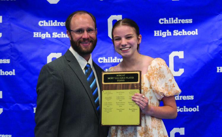 Kara Palomo, right, accepts Lady Cat Tennis Most Valuable Player (MVP) from Athletic Director Bo Helm. Not pictured is Bobcat Tennis MVP Ben Souder.