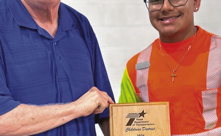 TxDOT Childress District Engineer Darwin Lankford recognizes Childress High School senior Jaden Rodriguez during National Intern Day recently.