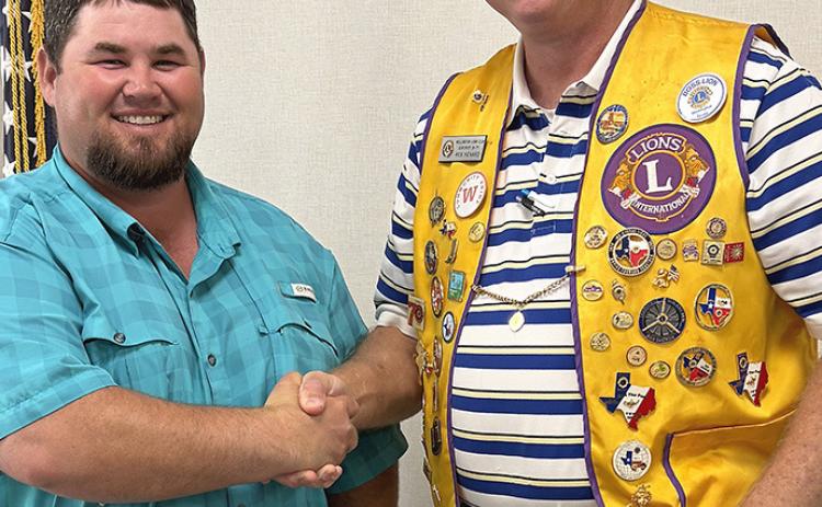 Wellington Boss Lion Rex Henard, right, expresses appreciation to Collingsworth County AgriLife Extension Agent Kenny Patterson for sharing his knowledge during the Monday, Aug. 17 meeting of Wellington Lions Club. Patterson mentioned that trees are in dire need of a deep watering system due to the ongoing drought. INTREPID PHOTO / BEV ODOM
