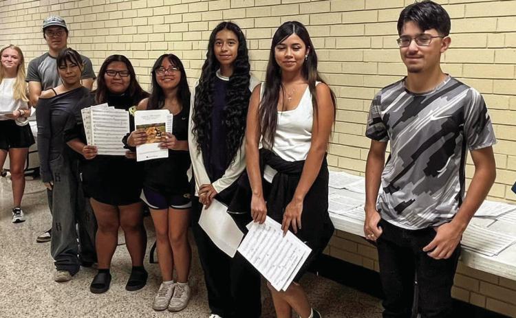 Members of the Memphis Cyclone Band gear up for the 2024-2025 year, sorting music and helping organize the band hall prior to the beginning of the school year. Photos Courtesy of Memphis ISD