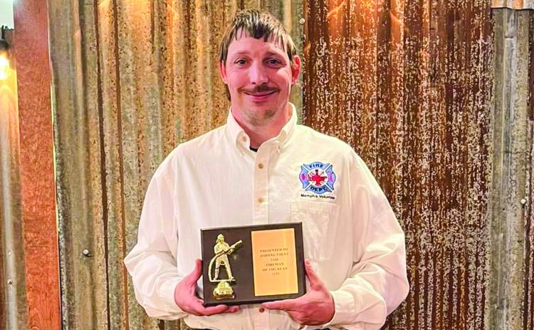 Memphis Volunteer Fire Department Volunteer Fireman Johnny Trent receives Memphis Volunteer Fire Department (VFD) Firefighter of the Year during the annual Christmas party Sunday, Dec. 10 at Lakeview Grill. “Johnny continuously works hard and always has a positive attitude,” Memphis Volunteer Fire Department said in a Facebook post. “Congratulations to Johnny Trent for being selected as the Memphis Volunteer Firefighter of the Year.” Photo Courtesy of Memphis Volunteer Fire Department