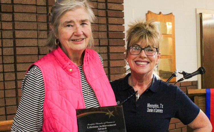 Longtime Memphis resident Jackie Owens is awarded the Lifetime Achievement Award, presented by Memphis Chamber of Commerce President Leslie Ivy, during the 105th Annual Memphis Chamber of Commerce Banquet Friday, March 13 at the Memphis Community Center. The Red River Sun/Elizabeth Tanner