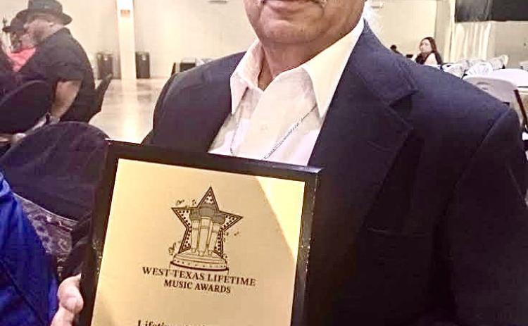 KLSR 105.3 radio personality Fernando “Cricket” Garcia is honored with the Lifetime Achievement Award at the Second Annual West Texas Lifetime Music Awards, organized by 22 Entertainment, Saturday, March 21 at the Prima Vista Event Center in Lubbock. Courtesy Photo