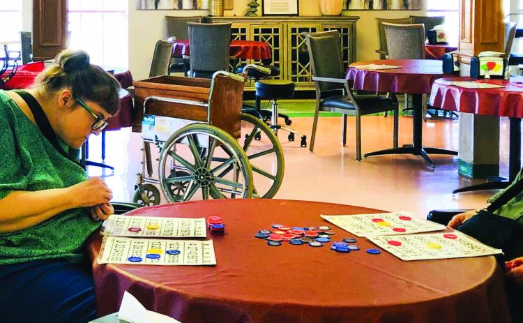 Wellington Care Center Activity Director Dorothy Massey calls bingo for residents Thursday afternoon, Feb. 2. The Red River Sun/Bev Odom