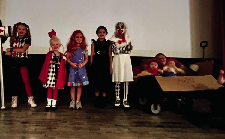 Costume contest winners enter the state of the Wellington Ritz Theatre Monday evening, Oct. 23. The contest began at 6 p.m., followed by the movie, “Room on the Broom,” at 6:30 p.m. From left: Jackson Needham, Bentley Keys, Blake Lemons, Harper Cox, Summer Valles, Kesley Hamner, Creed Patterson and Juniper Wilbur with Myka Kelch and Kaydence Mixon. Courtesy Photo