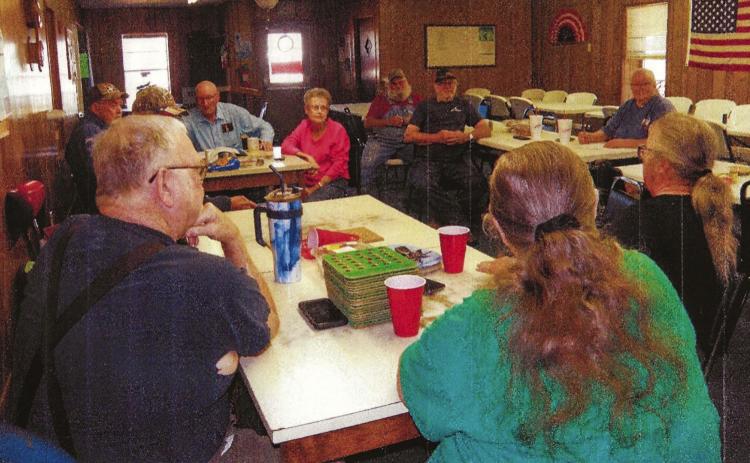 Childress Senior Citizens board members discuss plumbing issues within the center building during the May meeting. Attending the meeting are, foreground, from left, Mikel Goundie, Pam Goundie, Glenda Goundie, and background, from left, James Watson, Franklin Wyatt, Mickey Ferrell, Jannas Watson, James Votaw, Morris Grayson, Connie Grayson. Photo by Grace Holman