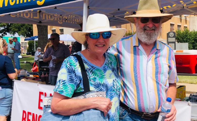 Rae-Lene Scarberry Wolf and her domestic partner, Jim Leach, partake in the fun on the Collingsworth County Courthouse Square during Wild &amp; Free on 83 Saturday, Aug. 5. The Red River Sun