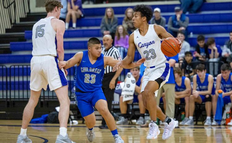 Childress’ Jesus Jalomo plays defense during the Tatum Tough Tournament championship game Saturday, Dec. 30 in Canyon. Press Pass Sports/Roy Wheeler