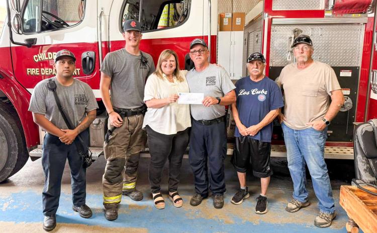 The 100 Club of the Texas Panhandle makes a recent $10,000 donation to the Childress Fire Department. THE 100 CLUB OF THE TEXAS PANHANDLE