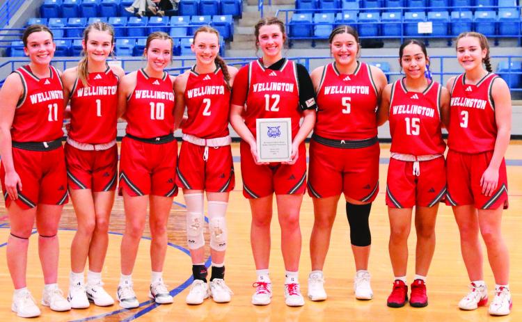 The Wellington Lady Rockets are the 4th Annual Childress Rotary Holiday Invitational Runner-Ups. From left: Ceighley Killian, Kambrie Fisher, Bryn Phillips, Taytum Kane, Brynlee Proffitt, Eryn Torres, Aundrea Garcia, Gannon Guy. Childress High School Yearbook