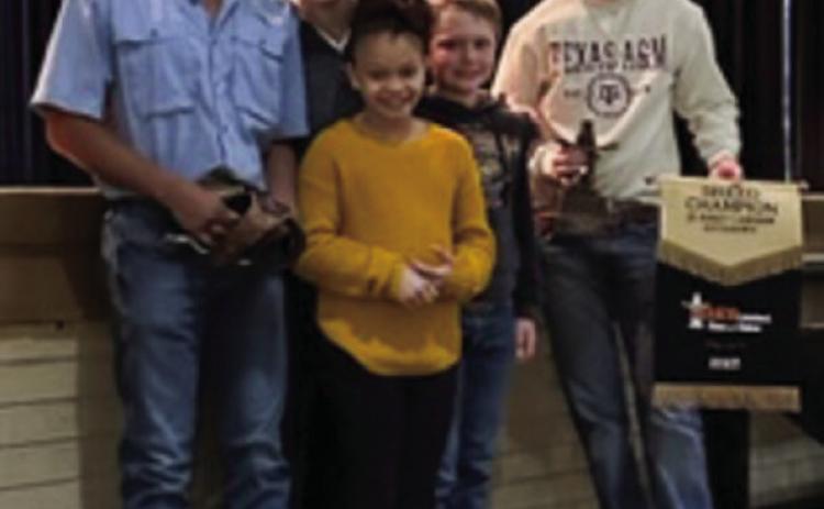The Memphis Independent School District (ISD) School Board recognizes students Gabriel Zuniga, left, Braylee Brooks, Tucker Brooks, Carson Smith and Kyree Johnson for their recent stock show winnings. Photos Courtesy of Memphis ISD
