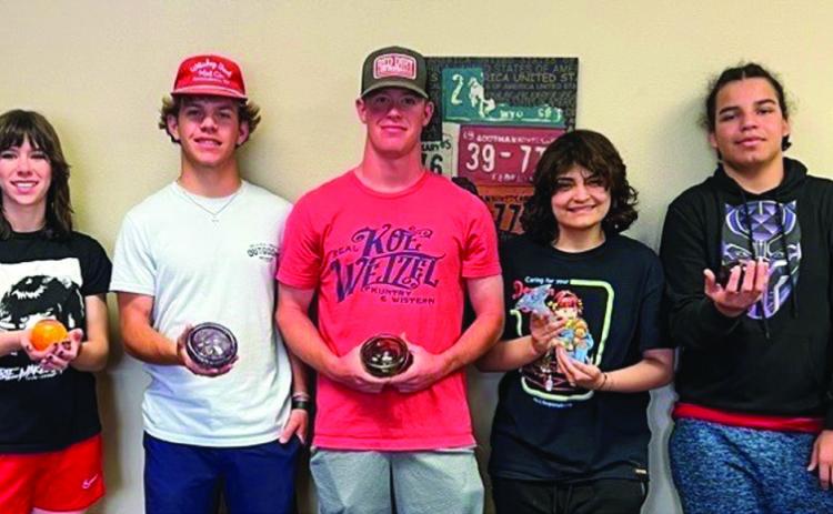 Wellington High School Gifted and Talented (GT) students recently traveled to Amarillo for their annual fieldtrip. GT Coordinator Renessa Klink and science educator Brandi Weinette accompanied the students to Blind Bird Designs, where each student created a glassblowing project. “Their finished projects were amazing as they learned a lot in the process,” Klink noted. From left: Addy Mock, Caleb Weinette, Barret Phillips, Damiana Peters, John Wall. Courtesy Photos