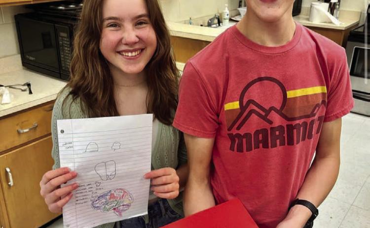 Photo Courtesy of Childress High School Childress High School educator Amy Detwiler’s Mental Health and Counseling class creates 3D models of the brain, including this edible one made of white cake by Chrissy Delgado, left, and Ryder Carroll.