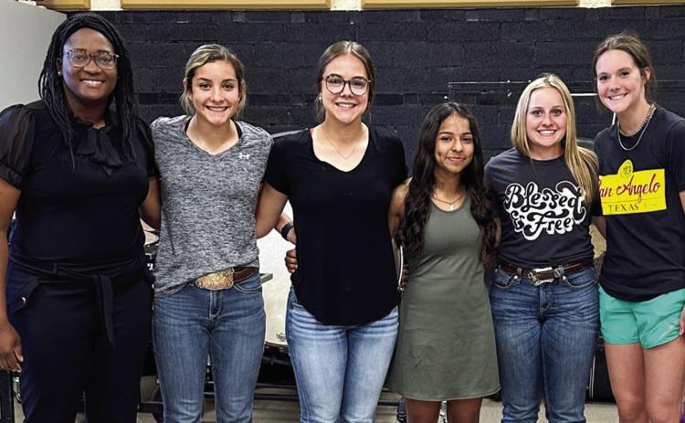 Lady Cyclone track and field area qualifiers, including Nairobi Espinoza (4x100), Ana Graham (400 meters, 4x100), Macaela Graham (100 meters, 200 meters, 4x100, high jump), Chloie O’Neal (4x100) and Emma Talley (4x100), are recognized at the recent Memphis Independent School District (ISD) School Board meeting. M. Graham is also a regional qualifier in the 100 meters. From left: Coach Kaprisha Casas, A. Graham, M. Graham, Espinoza, O’Neal, Talley. Photos Courtesy of Memphis ISD