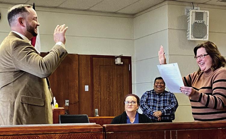Childress County Judge Kim Jones swears in Childress County Sheriff Matthew Bradley, former Childress Police Sergeant, Monday, Nov. 14 in the Childress County Courthouse Courtroom. Bradley recently won the race for Childress County Sheriff, surpassing opponent Danny Gillem by 307 votes. The Red River Sun/Elizabeth Tanner