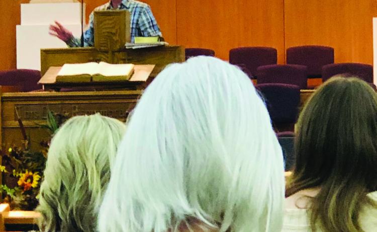 First Methodist Church Pastor Gene Weinette reminds the crowd that one can always find something to be thankful for and to not worry during the recent Collingsworth County Ministerial Alliance Thanksgiving Service at First Baptist Church. The Red River Sun/Bev Odom
