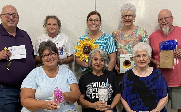 Bingo winners showcase prizes