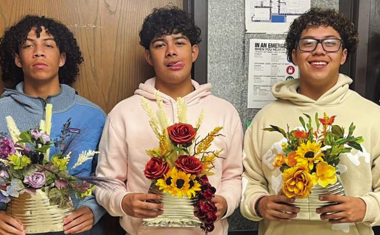 Floral design students repurpose pumpkins, tin cans