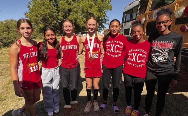 The Wellington Lady Rockets, including Anna Henard, Sabrina Segovia, Addalyn English, Taytum Kane, Leslie Orozco, Aleah Lewis and Angela Lewis, compete in the Palo Duro Lake Invitational Tuesday, Oct. 1 in Spearman. Courtesy Photo