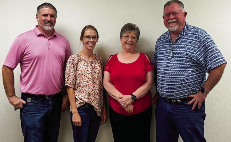Collingsworth Farm Bureau Insurance staff congratulates Saunda James on her 18 years of dedicated service. From left, Brandon Ward, Sierra Hartman, James, Durk Green. The Red River Sun/Shauna Salinas