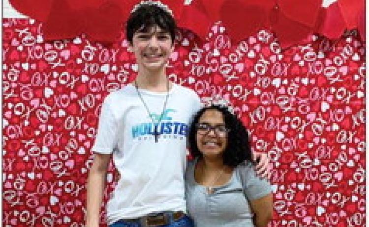 Memphis Junior High School eighth-graders Kyler Robison, left, and Jasmyn Gilchrest are named the Valentine’s Prince and Princess at the recent Valentine’s Day Dance Saturday, Feb. 11 at the Memphis Community Center. The dance, which served as a fundraiser for the Class of 2027, welcomed all Memphis Middle School students, offering games, prizes, a concession stand and music by DJ Ram. Photo Courtesy of Amalia Marie