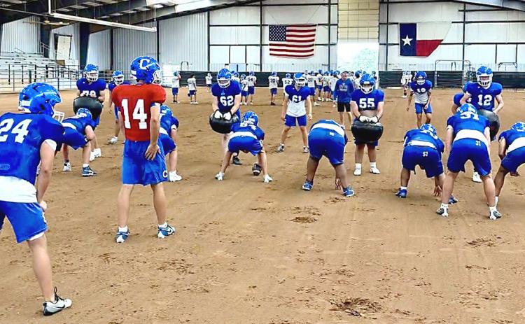 When the new Wet Bulb Globe Temperature guidelines tried to cancel practice, the Childress Bobcats improvised, trading the football field for the indoor rodeo arena, Thursday, Aug. 13. COURTESY PHOTO/ JUSTIN HASTINGS