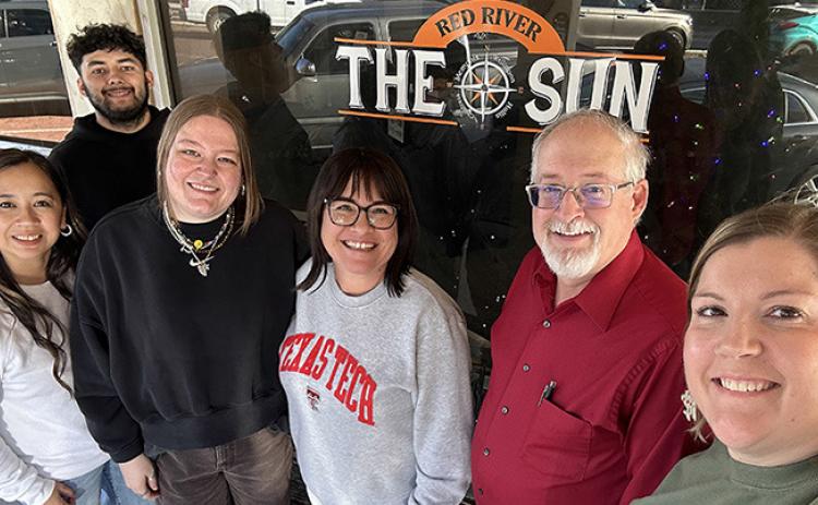 The Red River Sun employees Shauna Salinas and Synghyn Beasley-Vasquez with Managing Editor Elizabeth Tanner, The Clarendon Enterprise Advertising Manager Tara Allred and new owners Roger and Ashlee Estlack. The Clarendon Enterprise/Ashlee Estlack